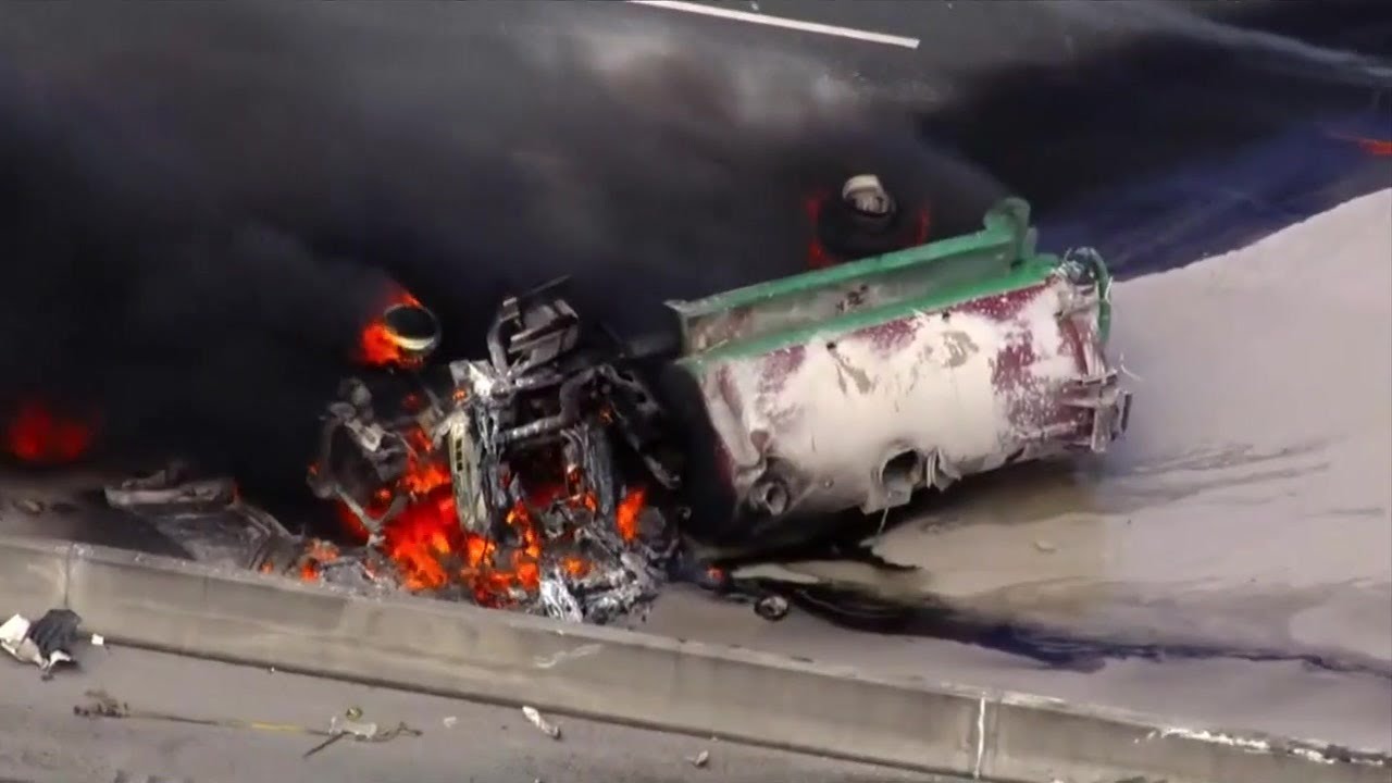 Off-duty firefighters rush to tanker driver's aid after fiery rollover crash in Davie