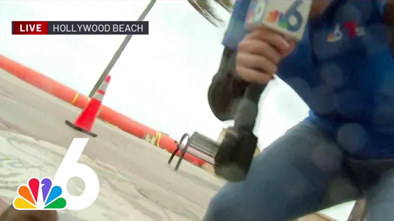 Intense winds KNOCK OVER NBC6 photojournalist on LIVE TV in Hollywood Beach