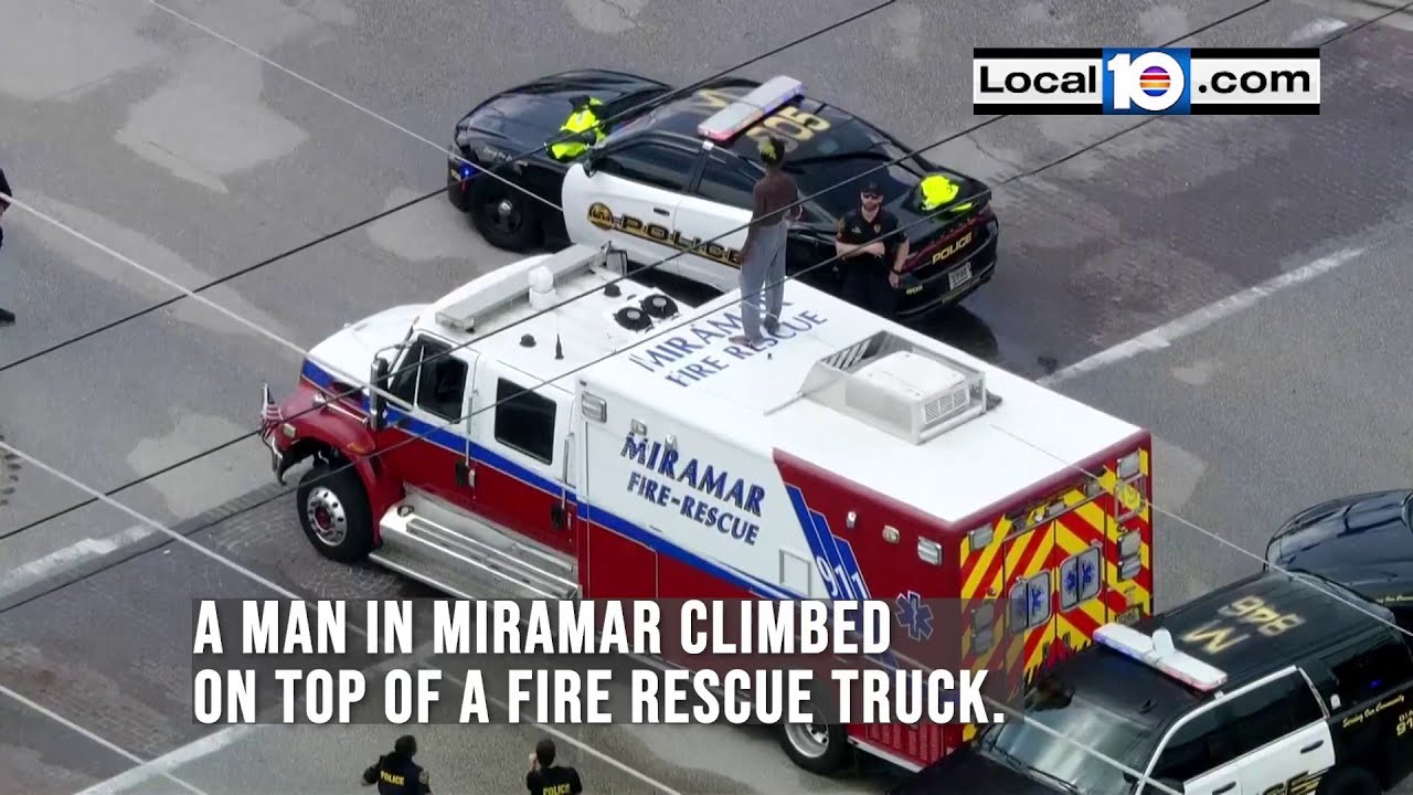 WATCH: A man in Miramar jumps on top of a fire rescue vehicle
