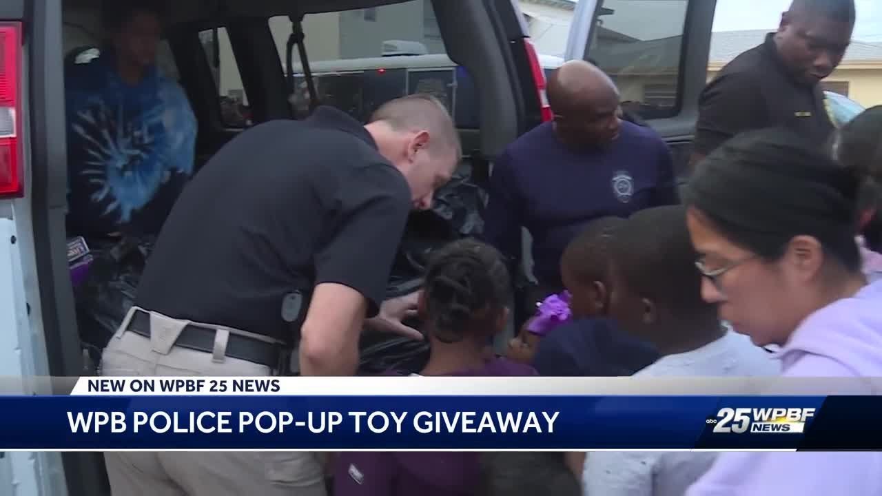 Police in West Palm Beach distribute presents at holiday pop-up event