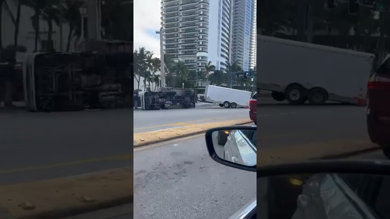 Lawn service truck with enclosed trailer flipped over in Hollywood Florida