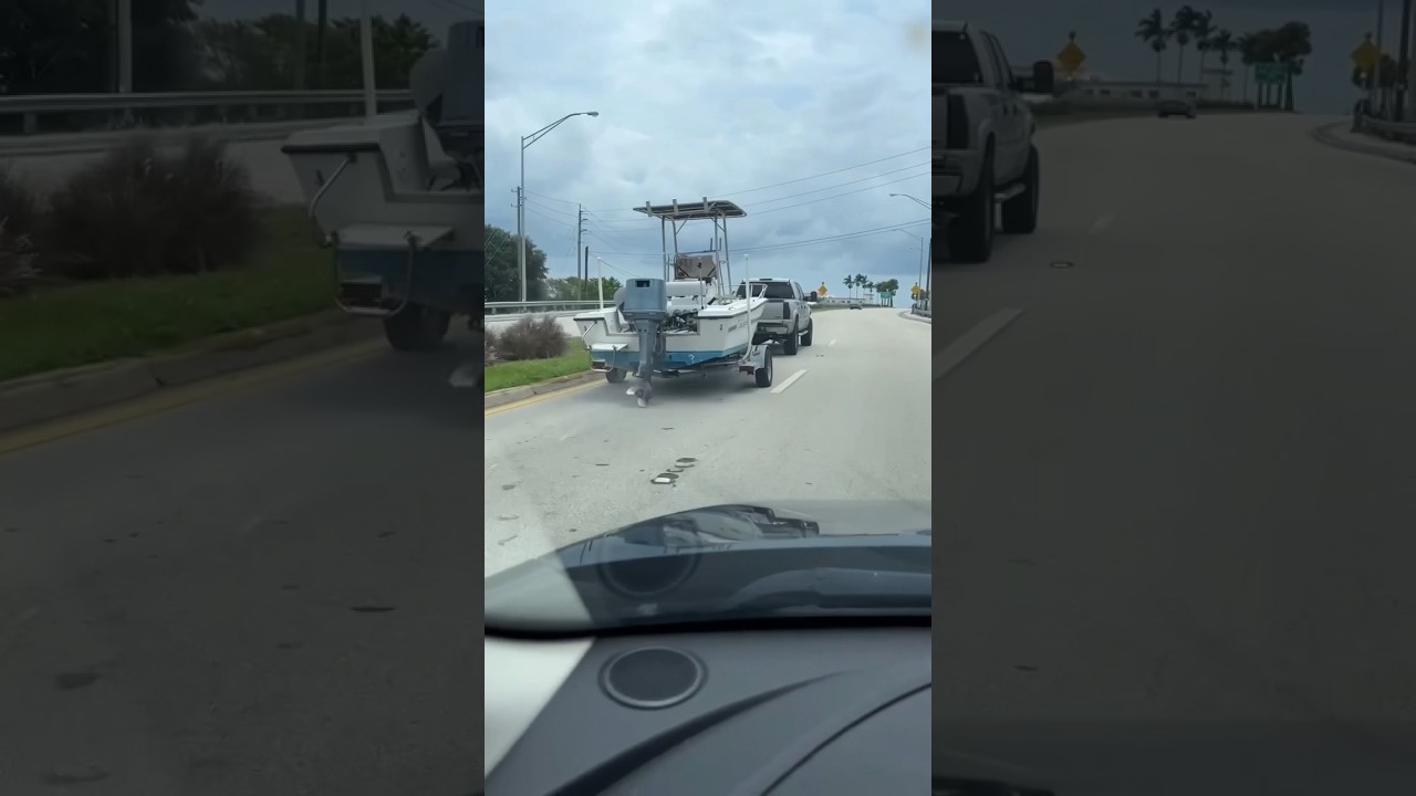 Pickup truck dragging boat motor propeller through the streets in Hollywood Florida