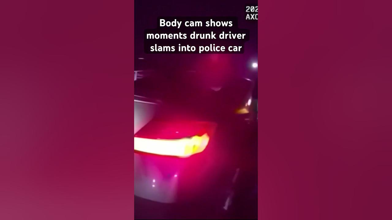 Body camera footage shows the moment a drunk driver crashed into a parked police car #police #crash