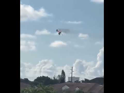 Police helicopter crashes into building in Pompano Beach, Florida, injuring multiple people.
