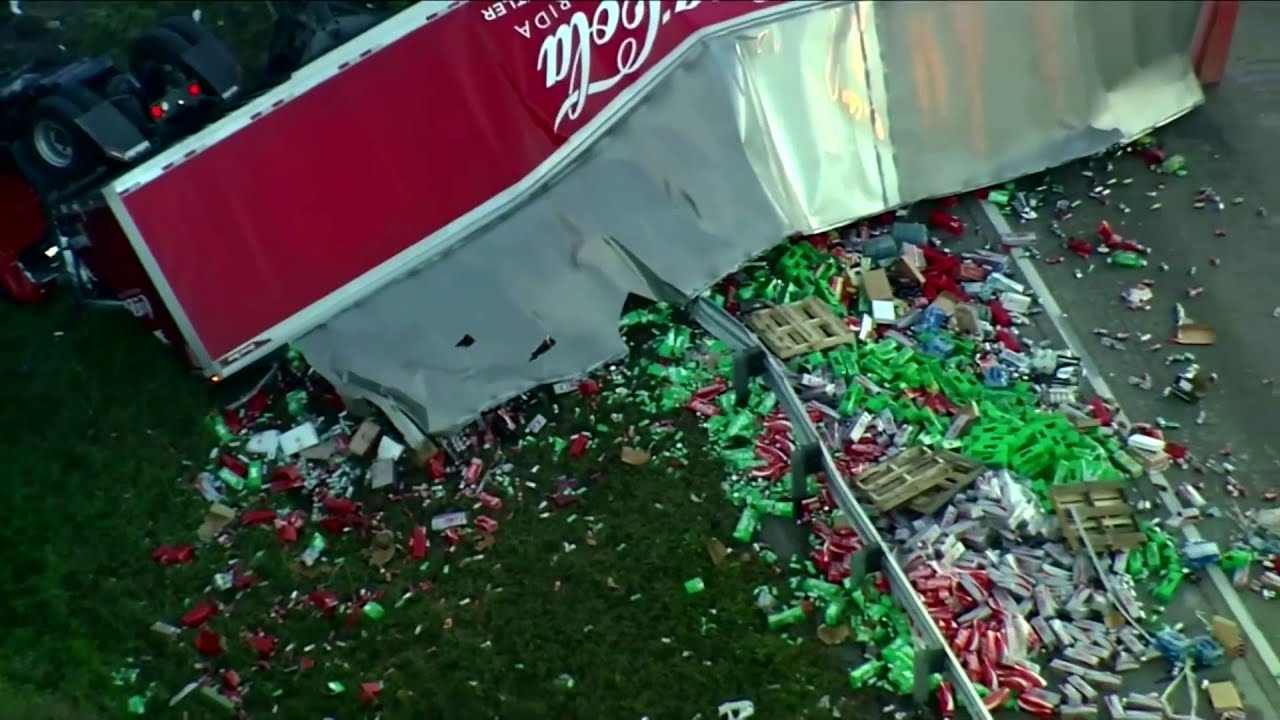 Sky 10 over Coca-Cola semi-truck overturned on I-95