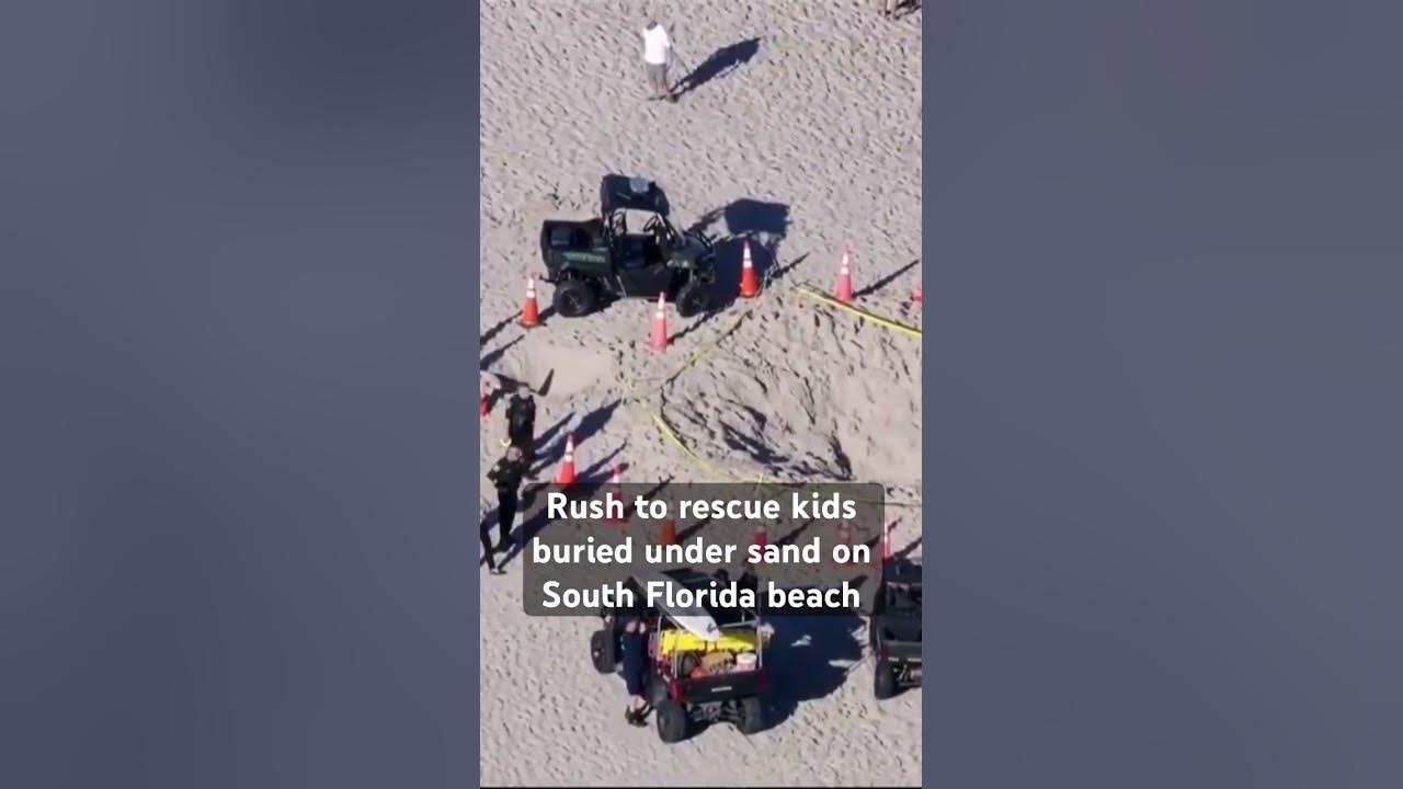 Two children were rescued after being trapped underneath sand in #lauderdalebythesea. #shorts