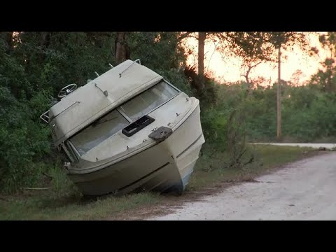 Boat dumped on side of road in Lehigh Acres
