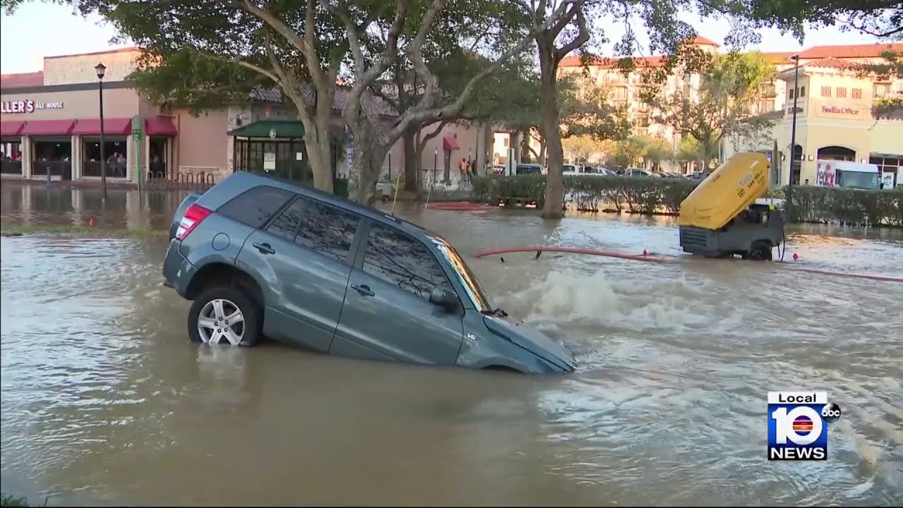 Water main break causes sinkhole that swallows SUV in Miami Lakes