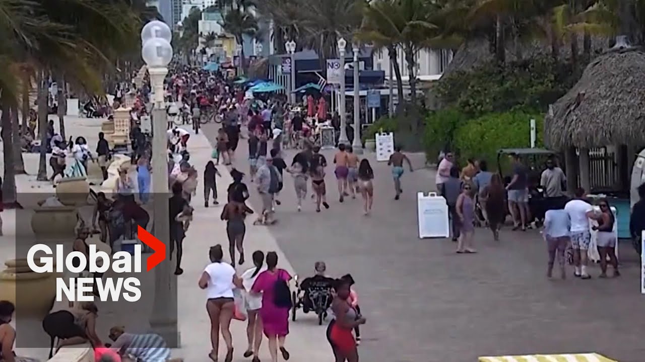 Beachgoers run for cover in Hollywood, Florida after shooting leaves 9 injured