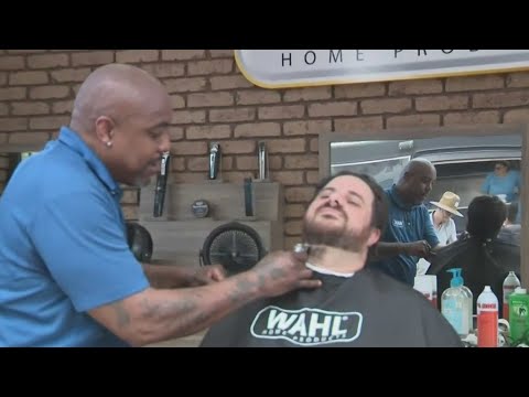 Fort Lauderdale barber uses his beard to help the homeless