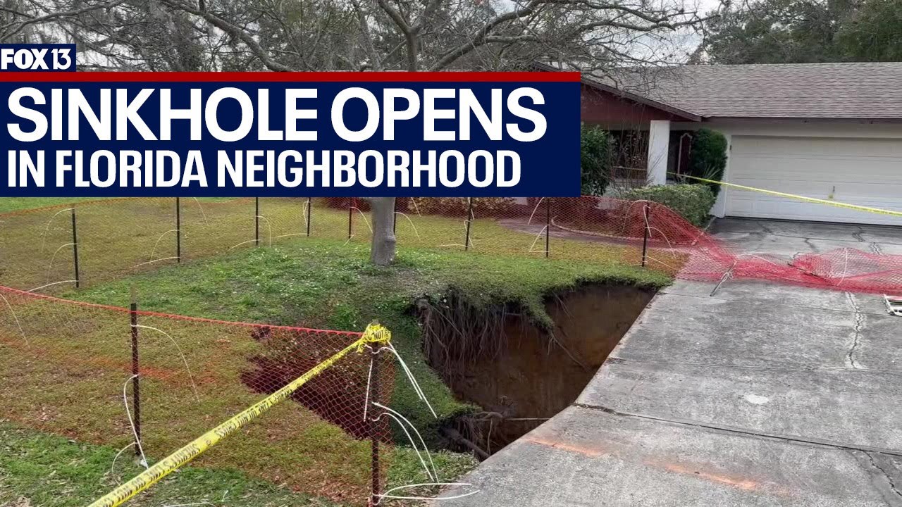 60-foot sinkhole opens up under Florida neighborhood