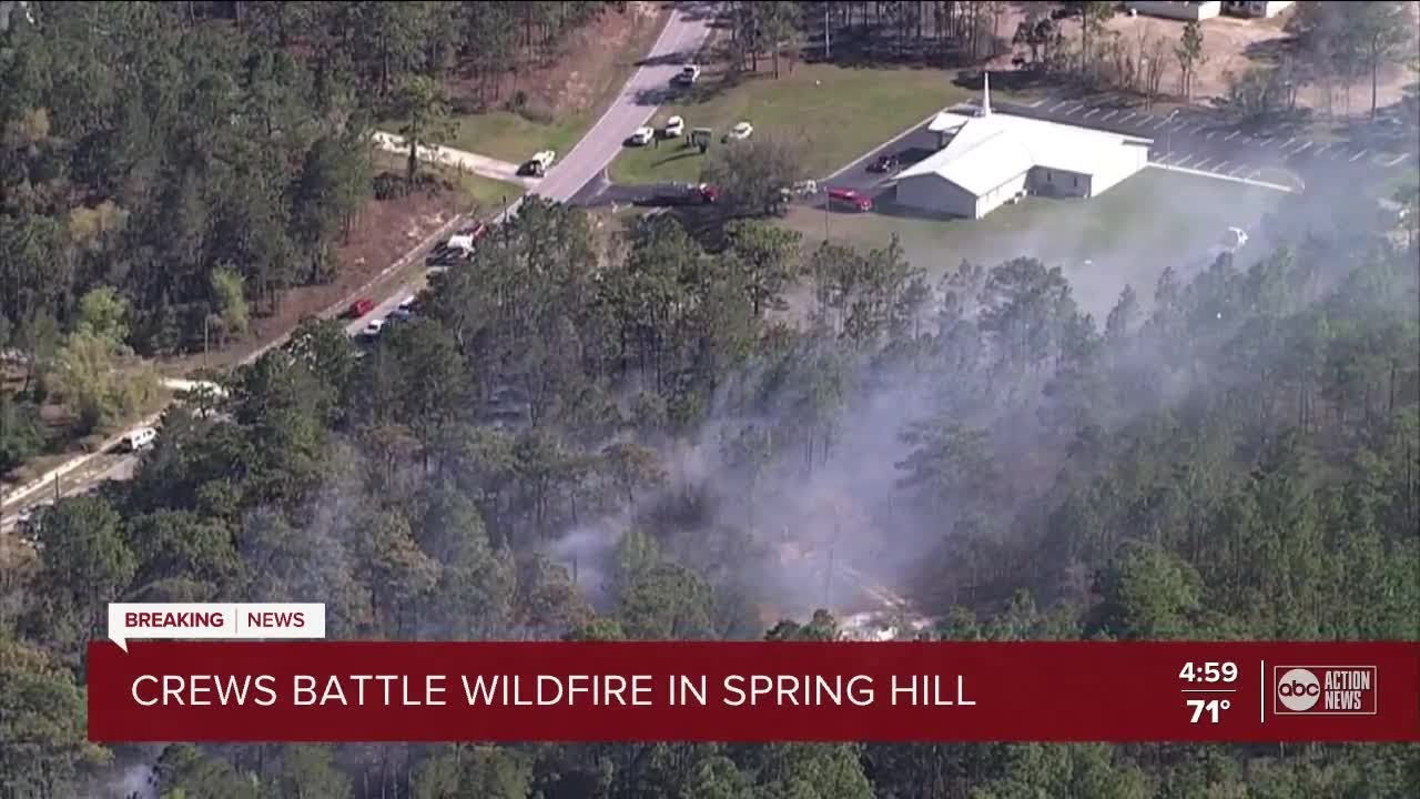 Crews battle 5-acre brush fire in Spring Hill