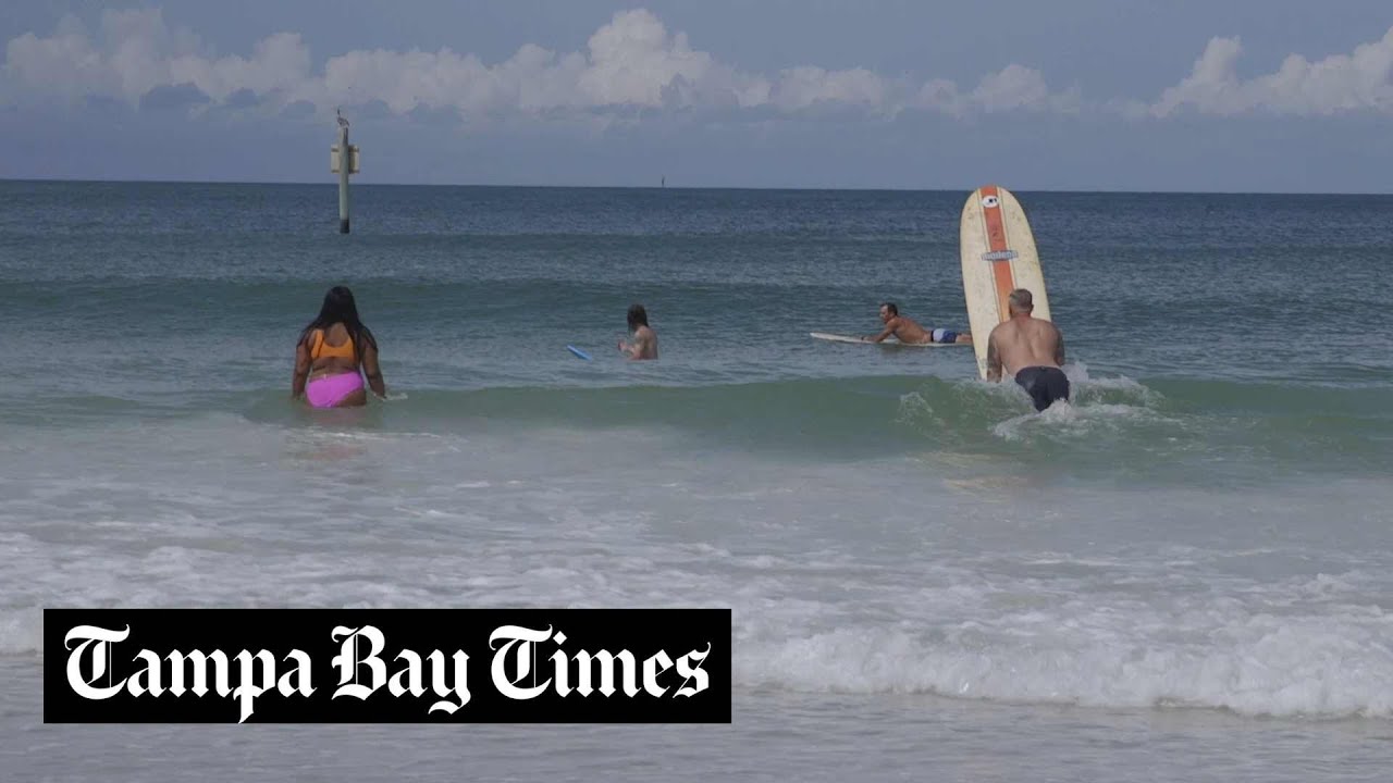 Beachgoers enjoy Clearwater Beach ahead of Hurricane Idalia