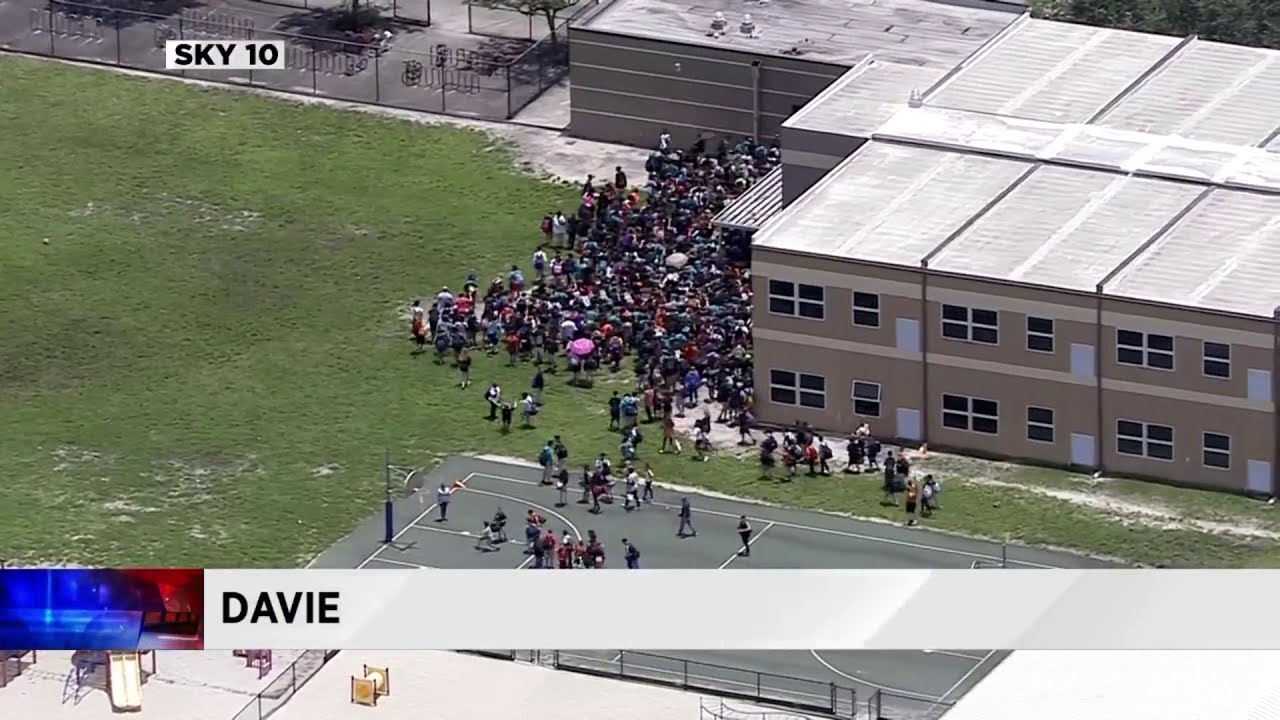 Students evacuate Indian Ridge Middle School in Davie