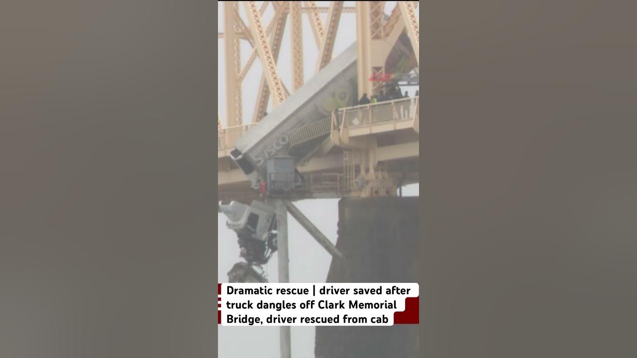 Dramatic rescue | driver saved after truck dangles Clark Memorial Bridge, driver rescued from cab